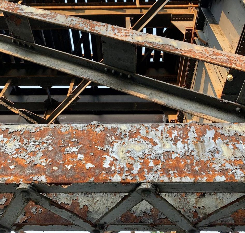 rusty-railway-bridge-946x900
